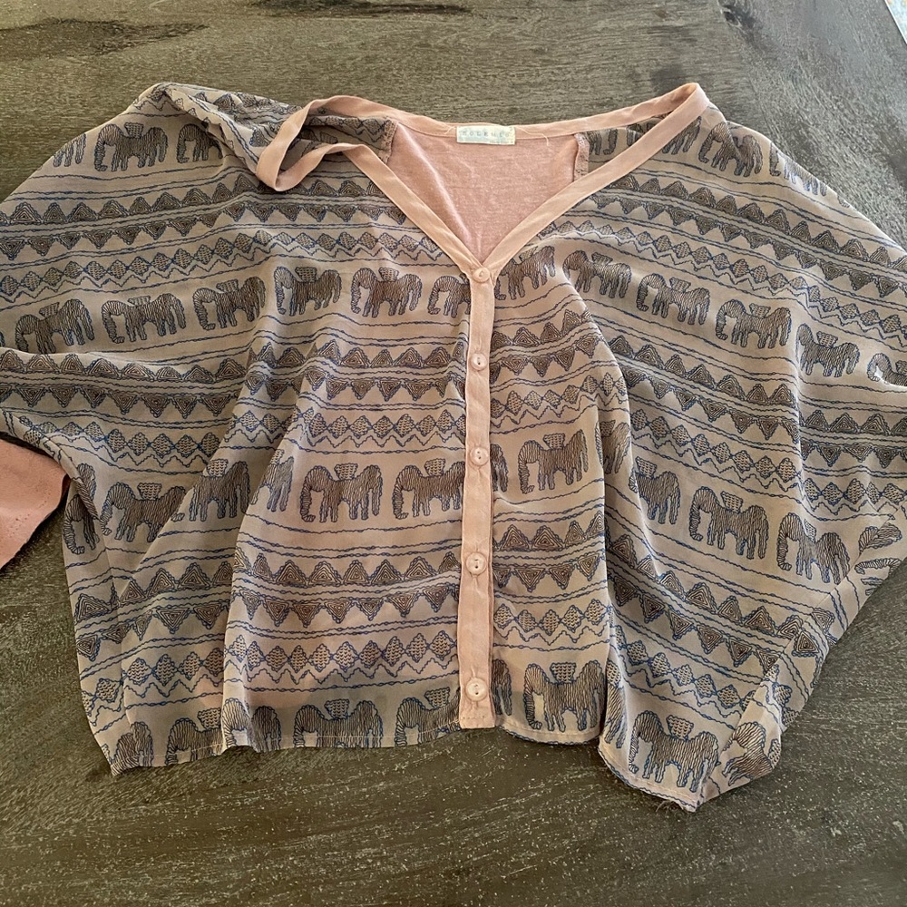 elephant patterned pink top
